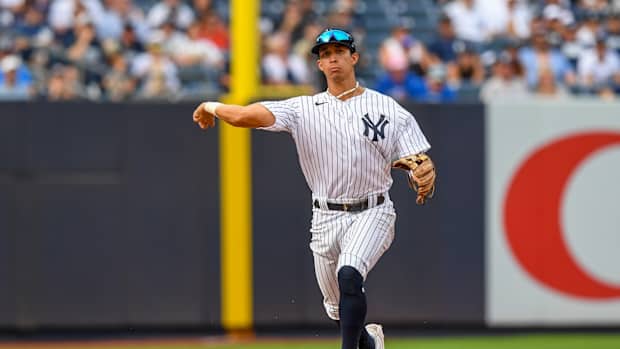 New York Yankees infielder Oswaldo Cabrera makes throw on infield